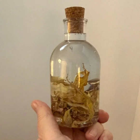 Unique Resin Decorative Bottle with Natural Dried Sunflower Petals - Picture 4 of 13